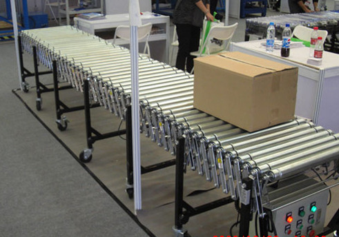 伸縮輥筒輸送機(jī)運(yùn)行圖，m.gcfae.cn